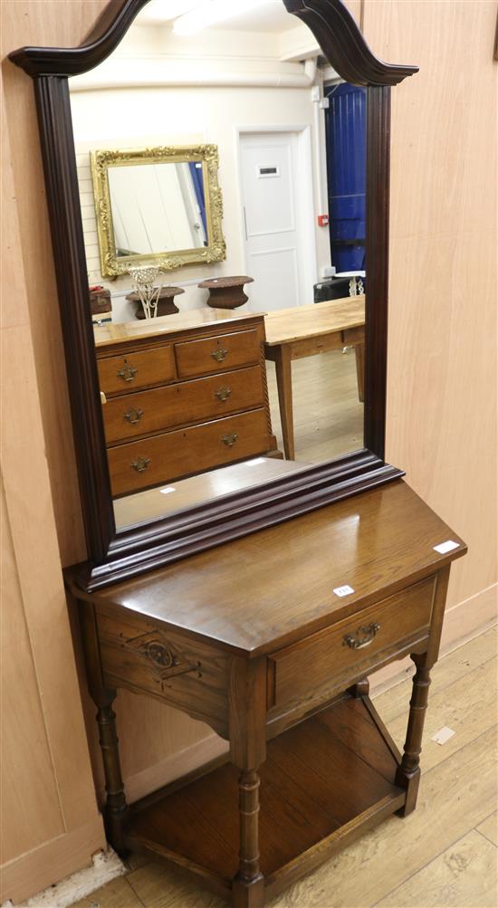 An oak hall table and a mirror, table W.84cm mirror W.82cm
